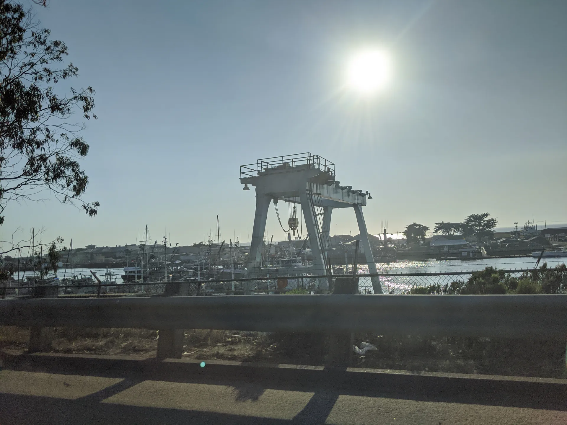 Moss Landing Harbor and waterfront on a sunny afternoon in Moss Landing, California.
