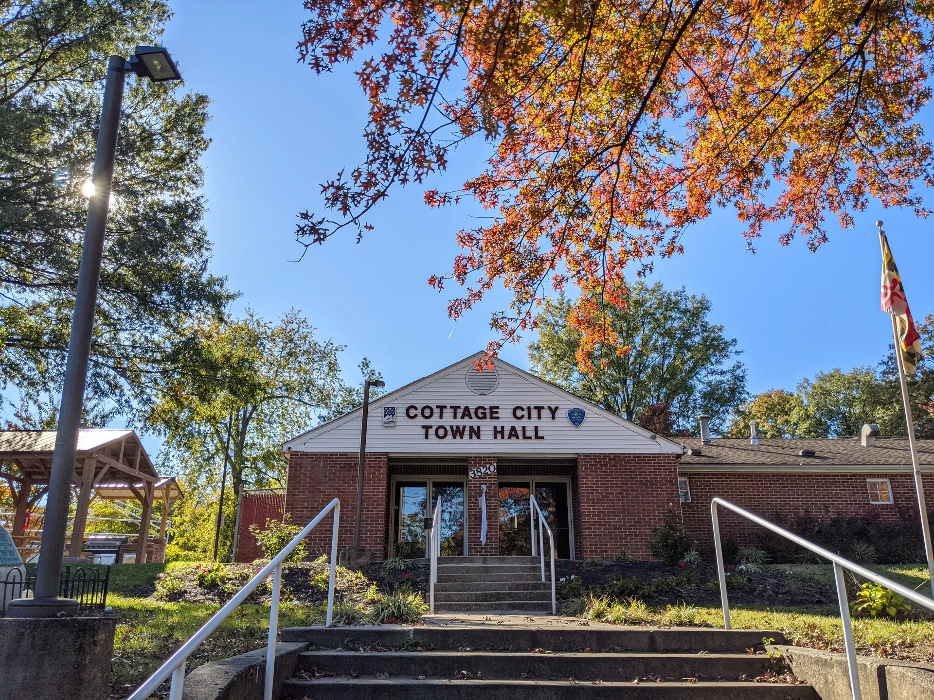 Cottage City Town Hall with autumn trees in Cottage City, Maryland.