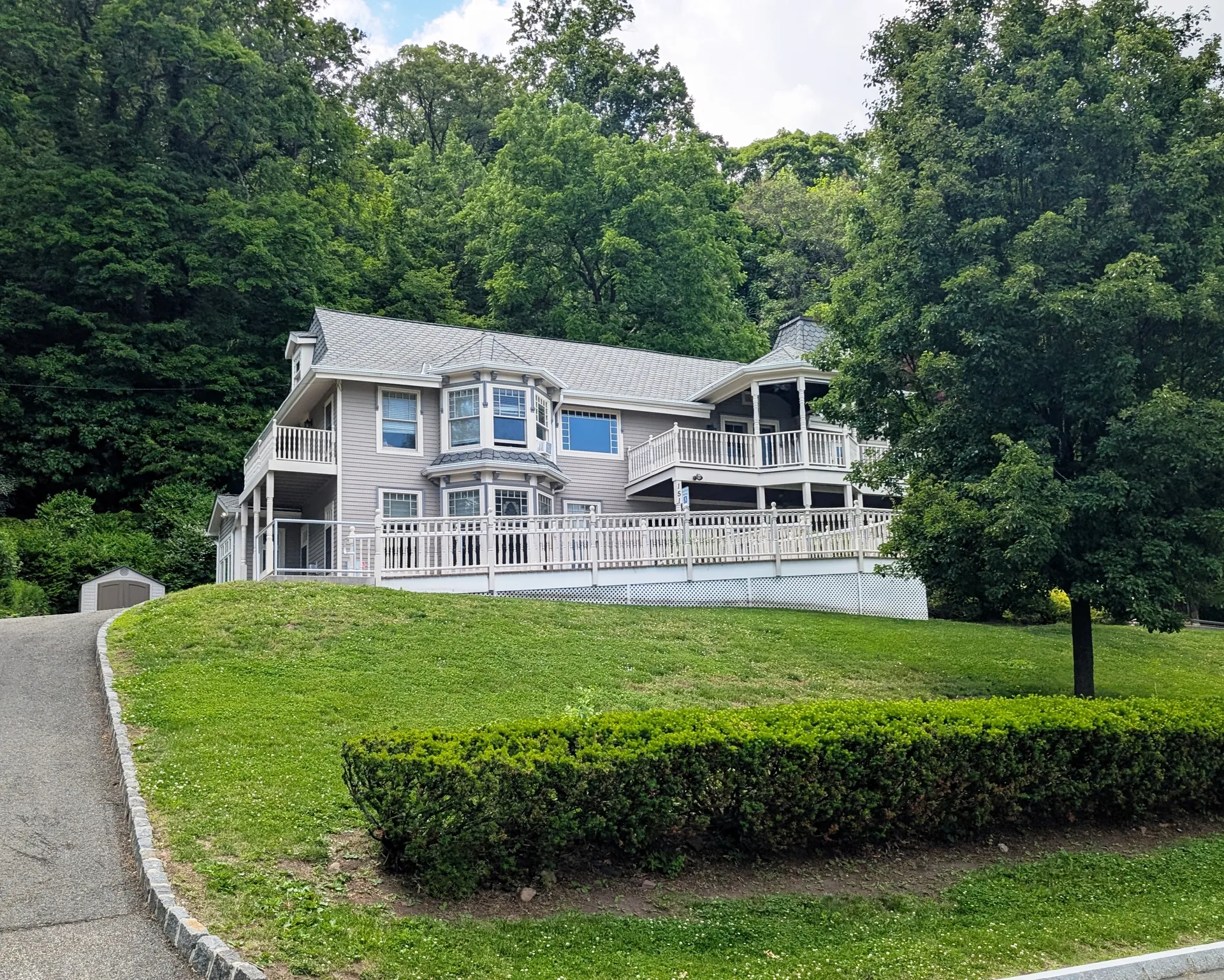 Grand View-on-Hudson Village Hall on a landscaped hillside in Grand View-on-Hudson, New York.
