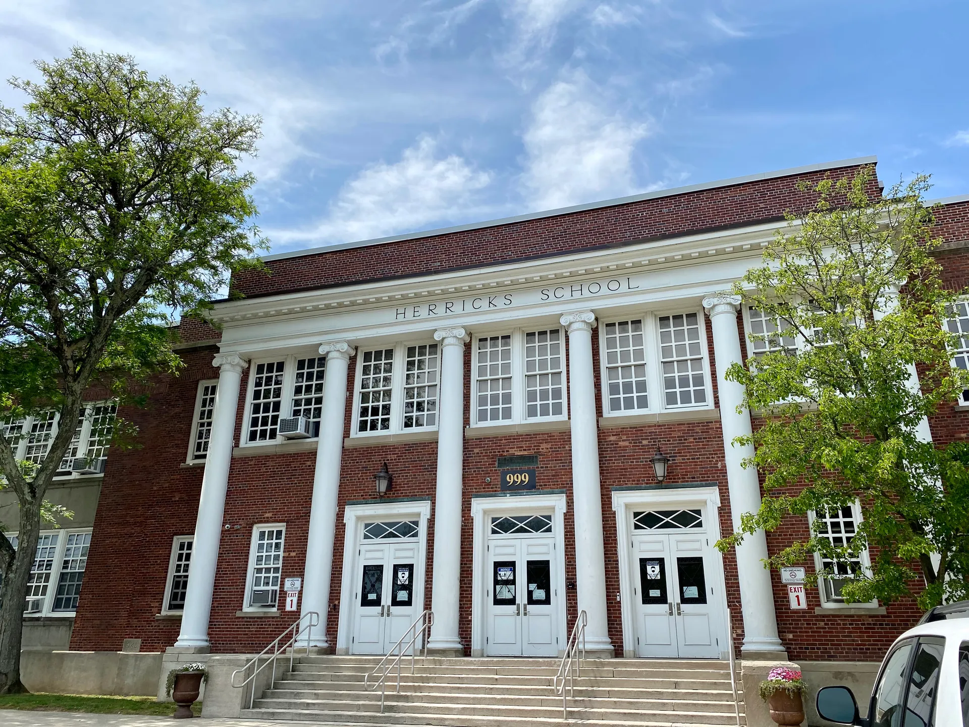 Columned brick Herricks Community Center in Herricks, New York.