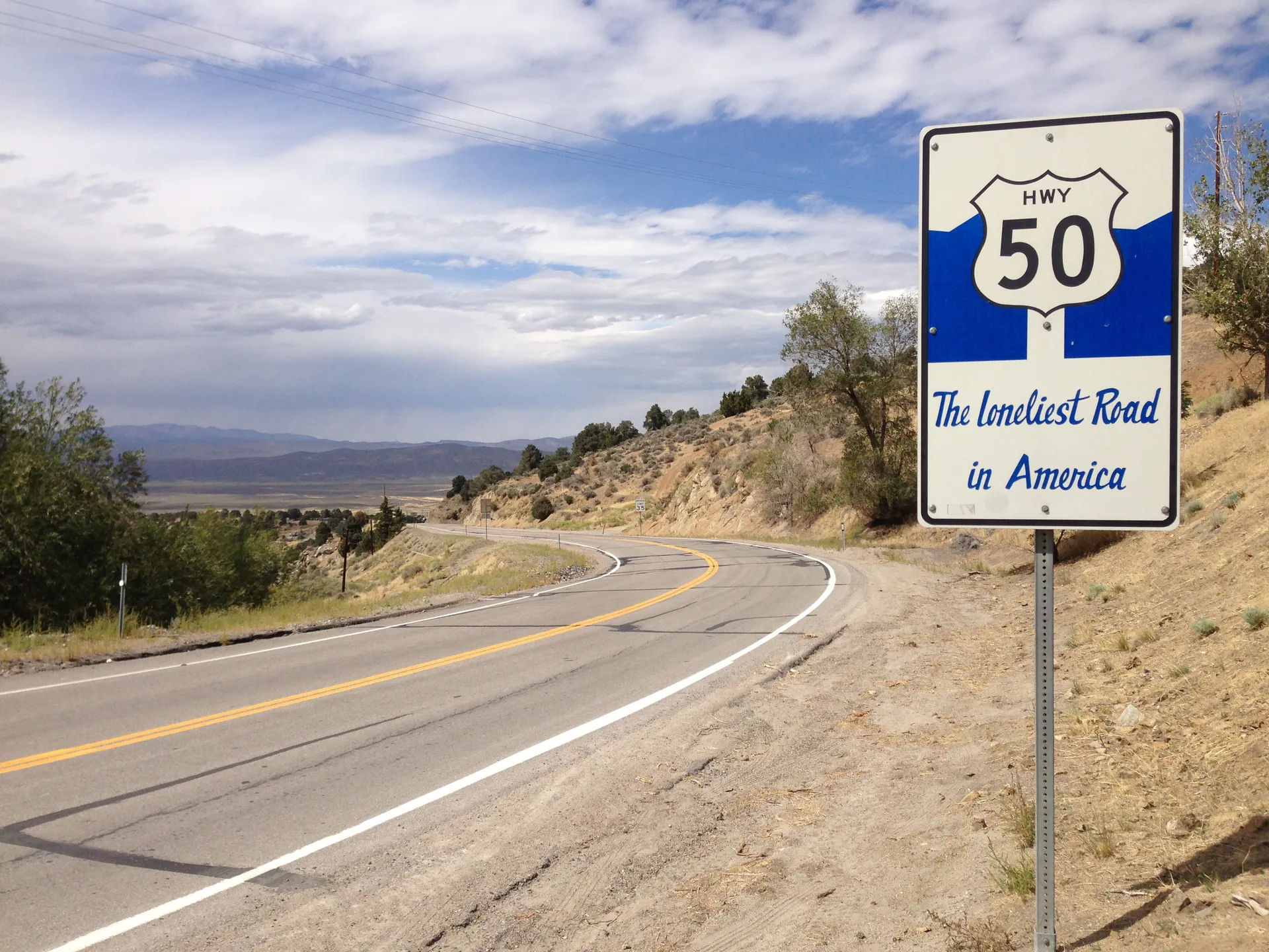 US Highway 50 Loneliest Road in America sign near Austin, Nevada.