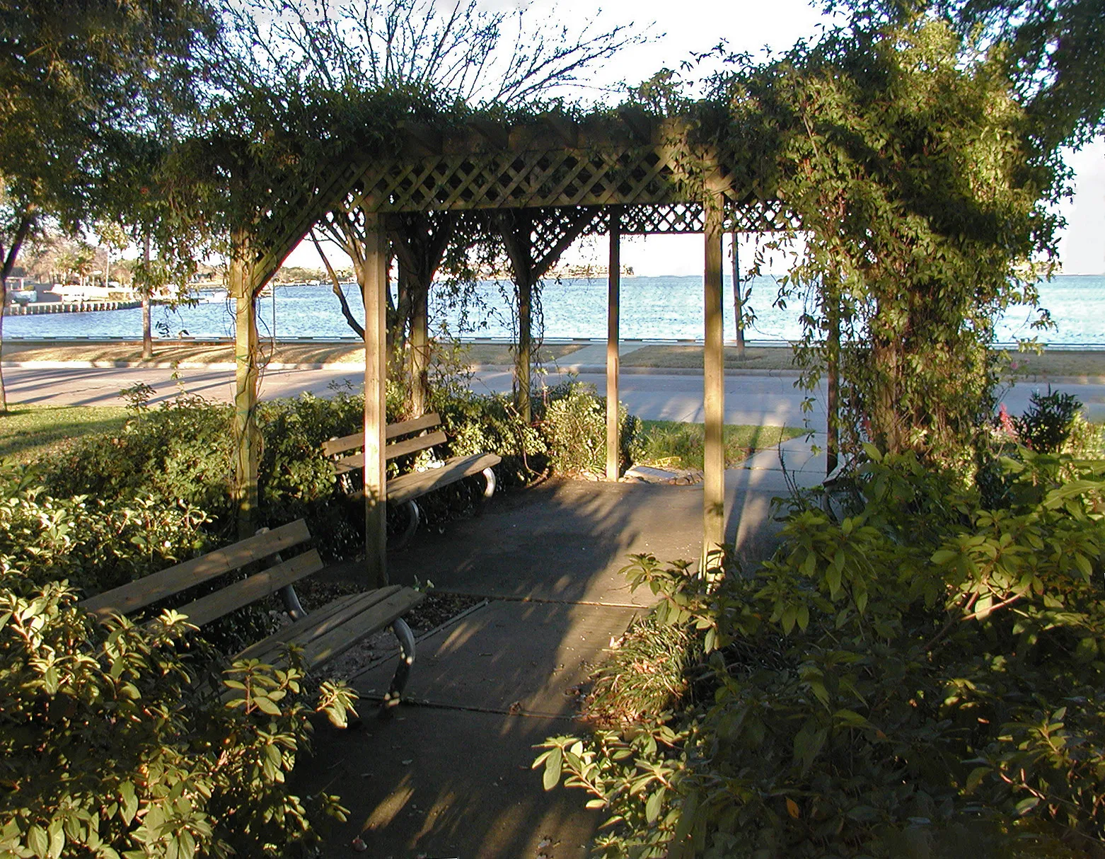 Shaded arbor overlooking the water at Howard Ward Park in Nassau Bay, Texas.