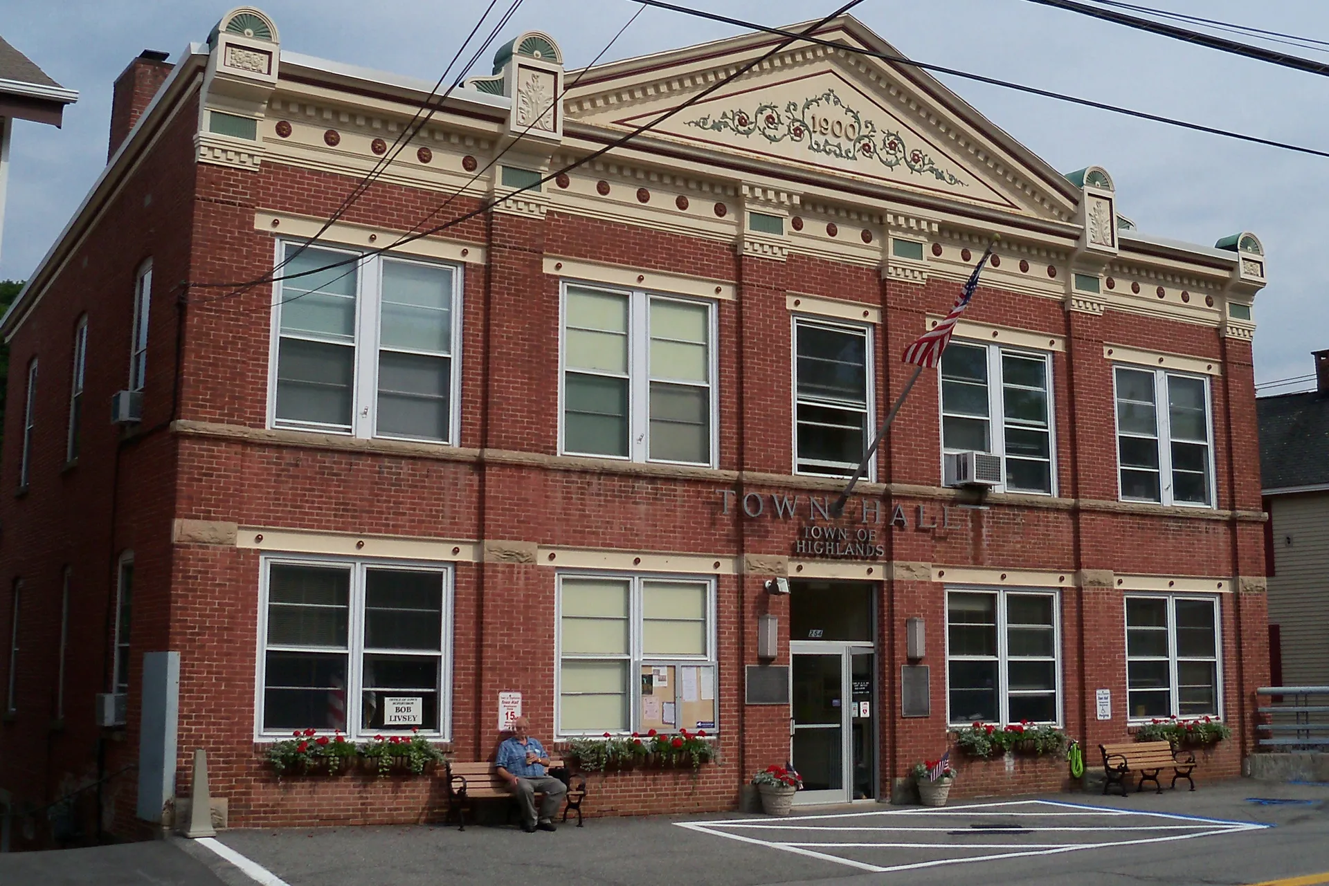 Historic brick Highlands Town Hall with an ornate pediment in Highland Falls, New York.