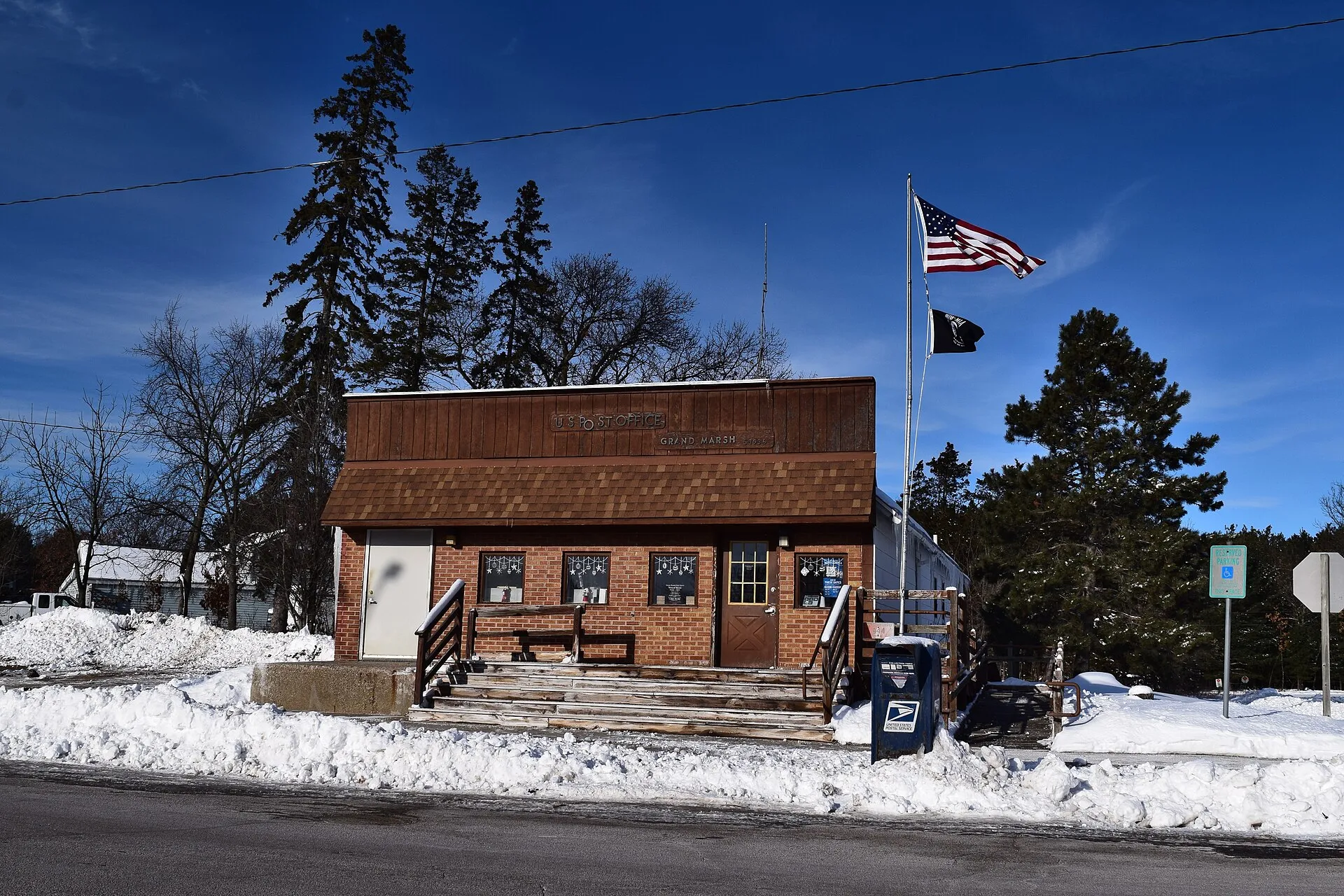 Grand Marsh post office building in winter in Grand Marsh, Wisconsin.