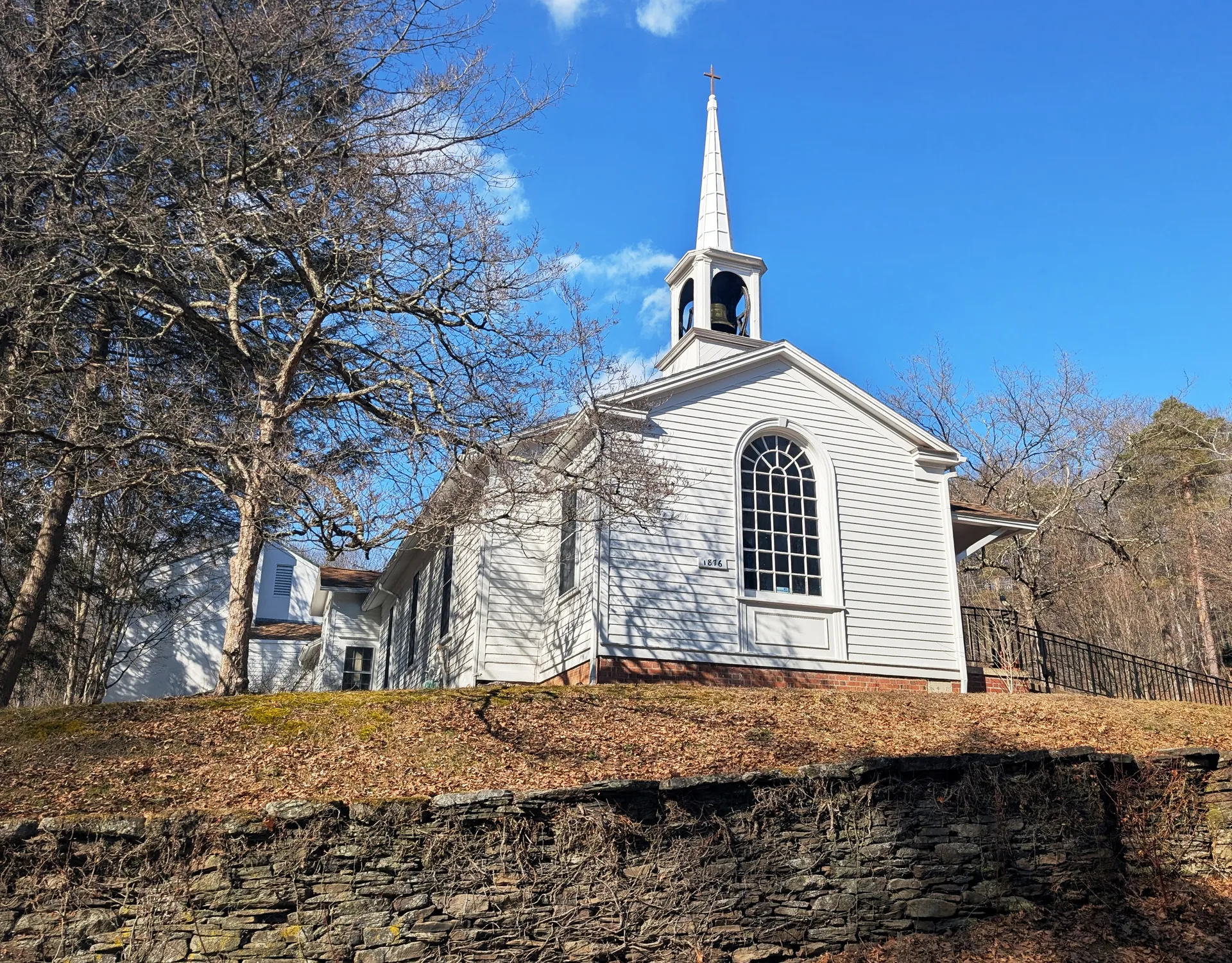 The Church of the Epiphany in Glenburn is a small white church with a pointed belfry on Church Hill Road.