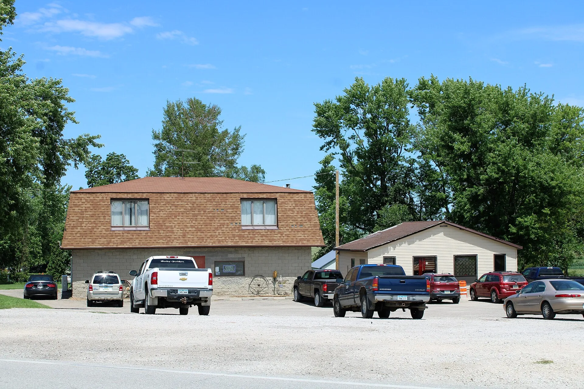 Small-town street with buildings in Plainview, Iowa.