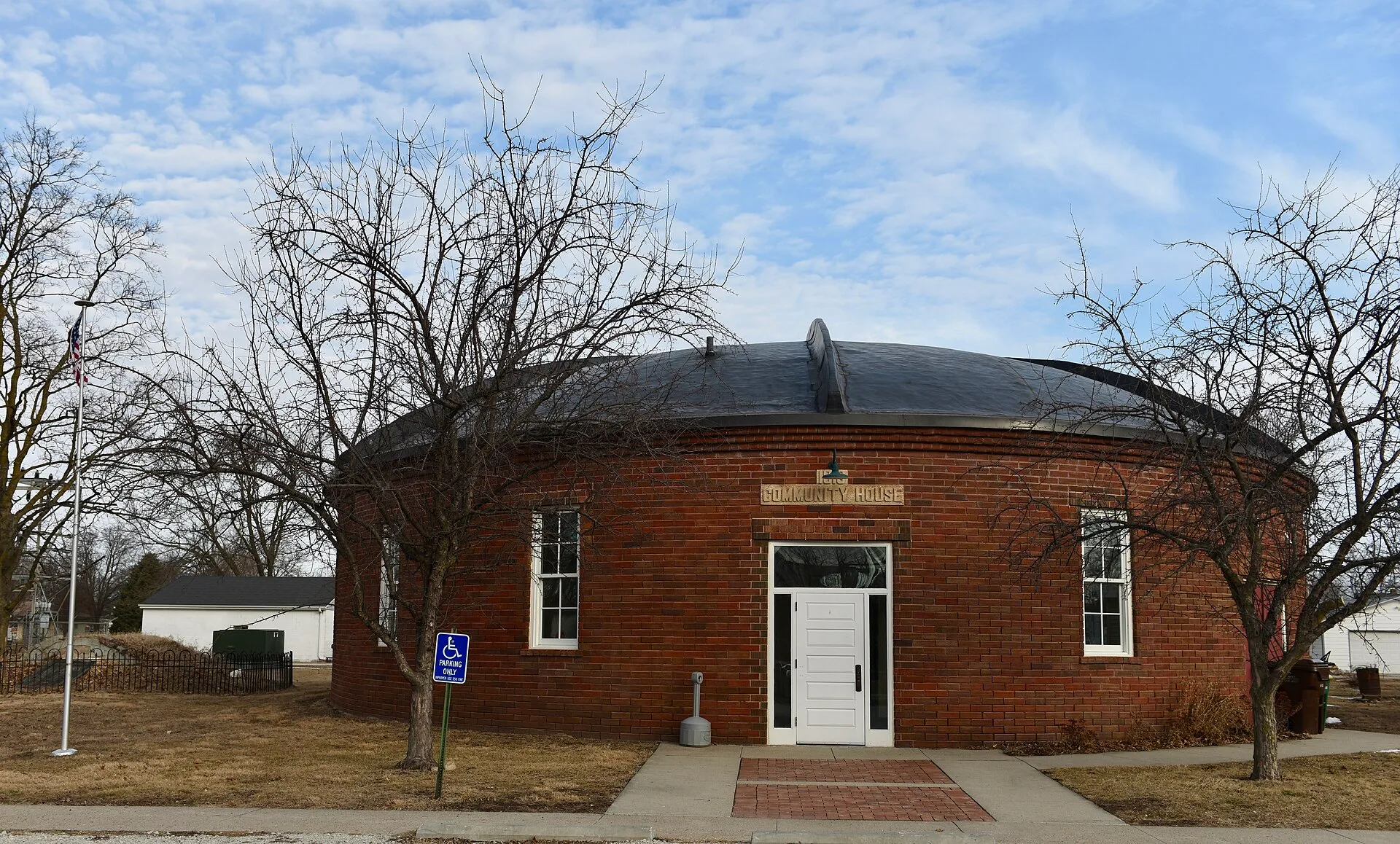 Historic round brick Dexter Community House in Dexter, Iowa.