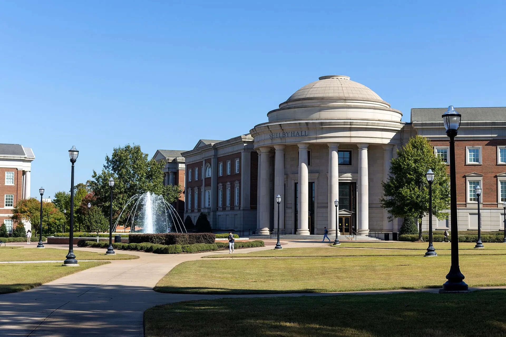A photograph of Shelby Hall and its fountain taken from the Shelby Engineering and Science Quad at the University of Alabama on October 22nd, 2024.