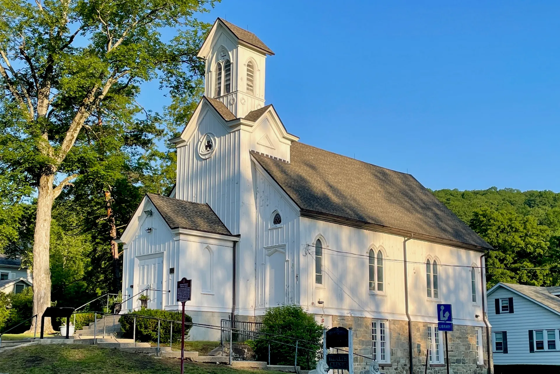 The Methodist Episcopal Church in Hibernia is a white gabled church with a square belfry and a side wing.