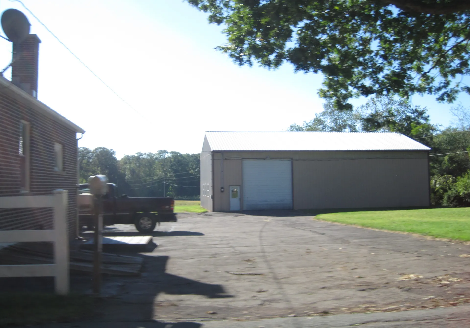 Lausanne Township's municipal building and garage is a tan metal structure beside a paved lot on Stagecoach Road.