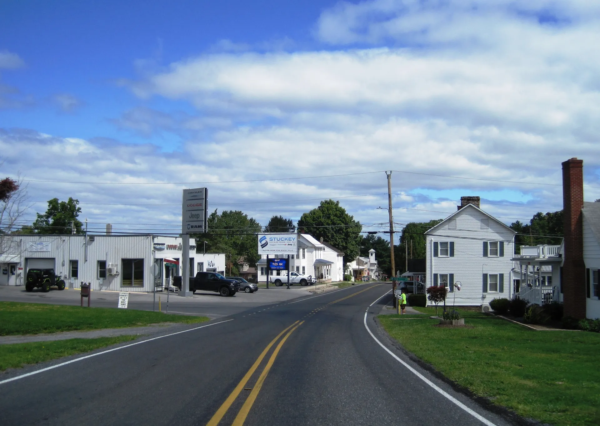 Walnut Street (Route 829) passes small businesses and white houses in Cassville, a Huntingdon County borough, between Main and Seminary streets.