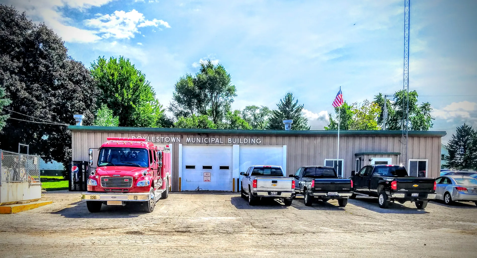 Doylestown municipal building with fire trucks in Doylestown, Wisconsin.