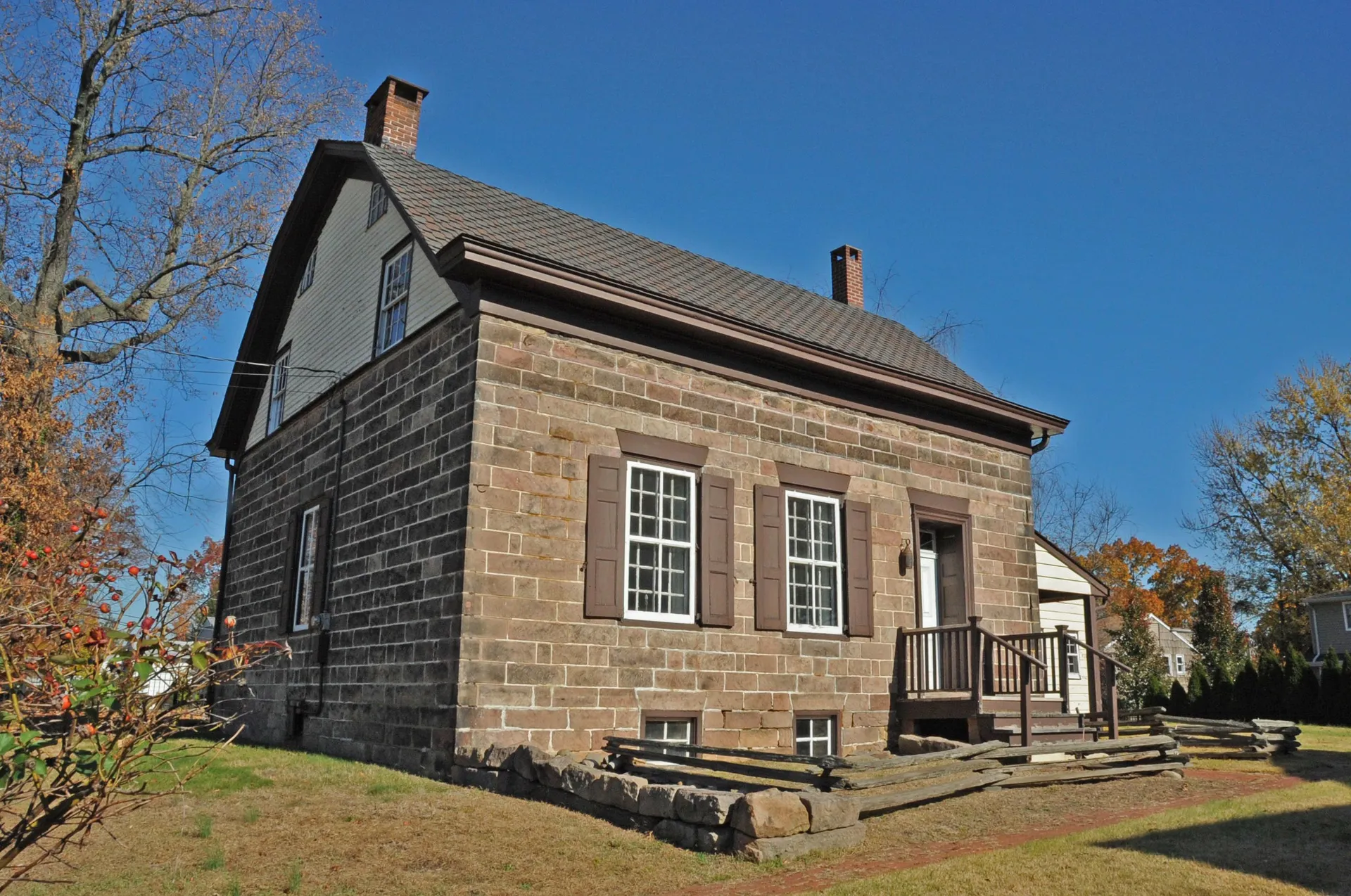 The Haring-Blauvelt House in Northvale is a sandstone Dutch colonial with a steep roof and a small side porch.