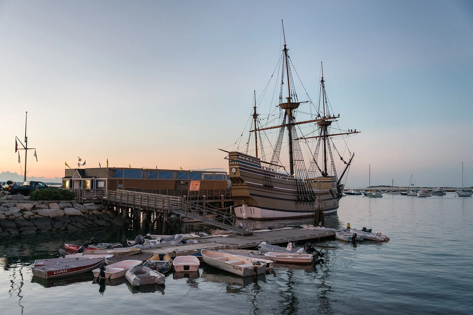 Mayflower II ship replica at twilight in Plymouth Harbor, Massachusetts.