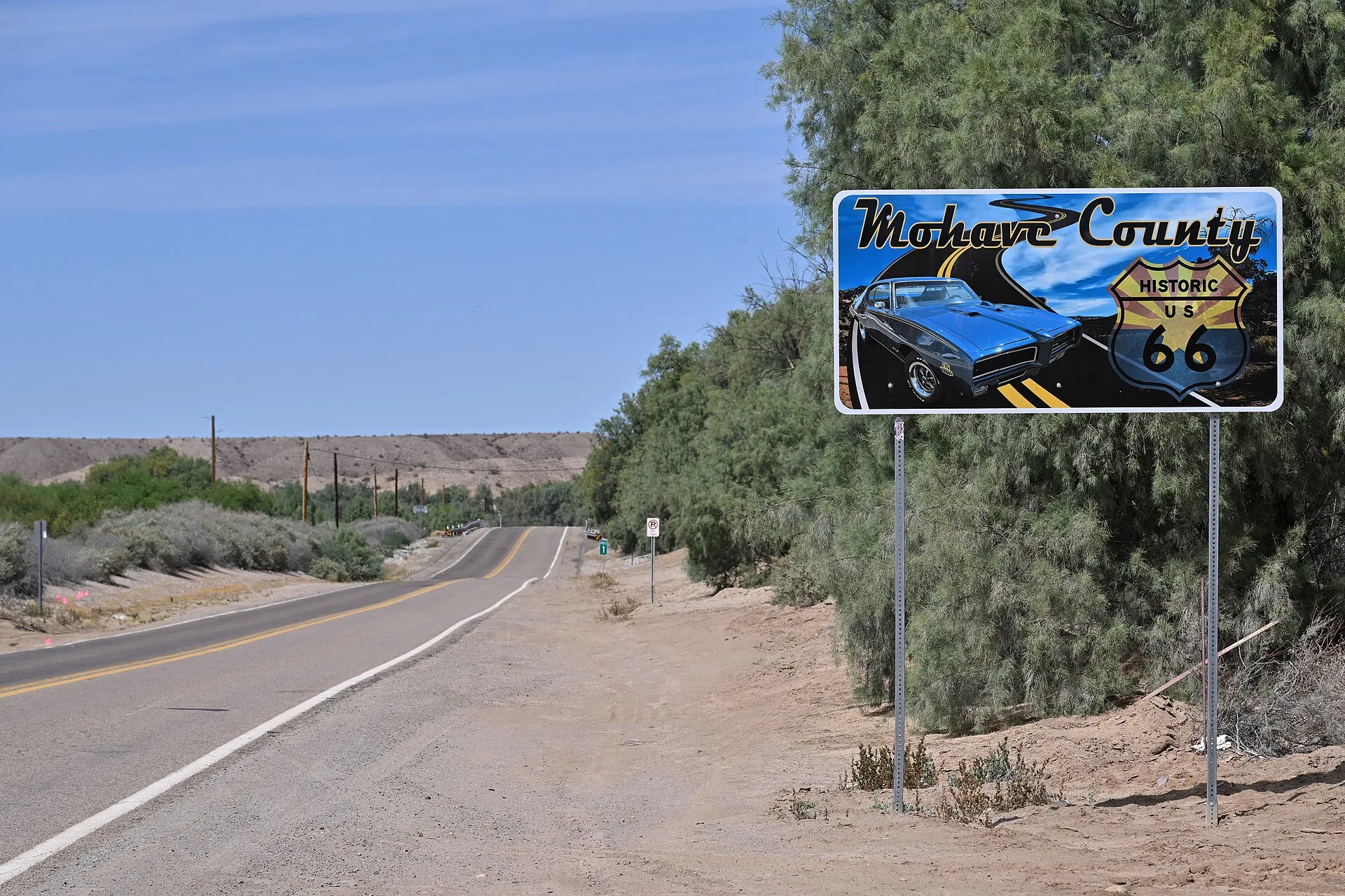 A sign alongside Oatman Hwy identifying it as the Mohave County portion of Historic U.S. 66. 14999 Oatman Highway, Topock, Arizona.