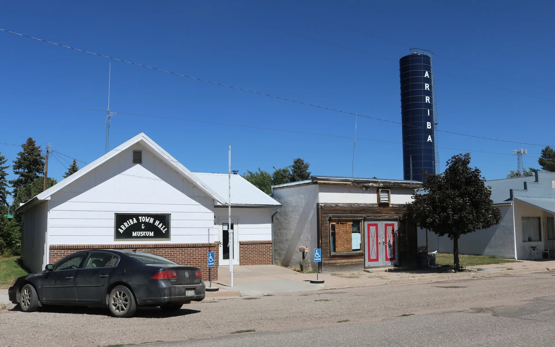 Small town buildings and water tower in Arriba, Colorado.