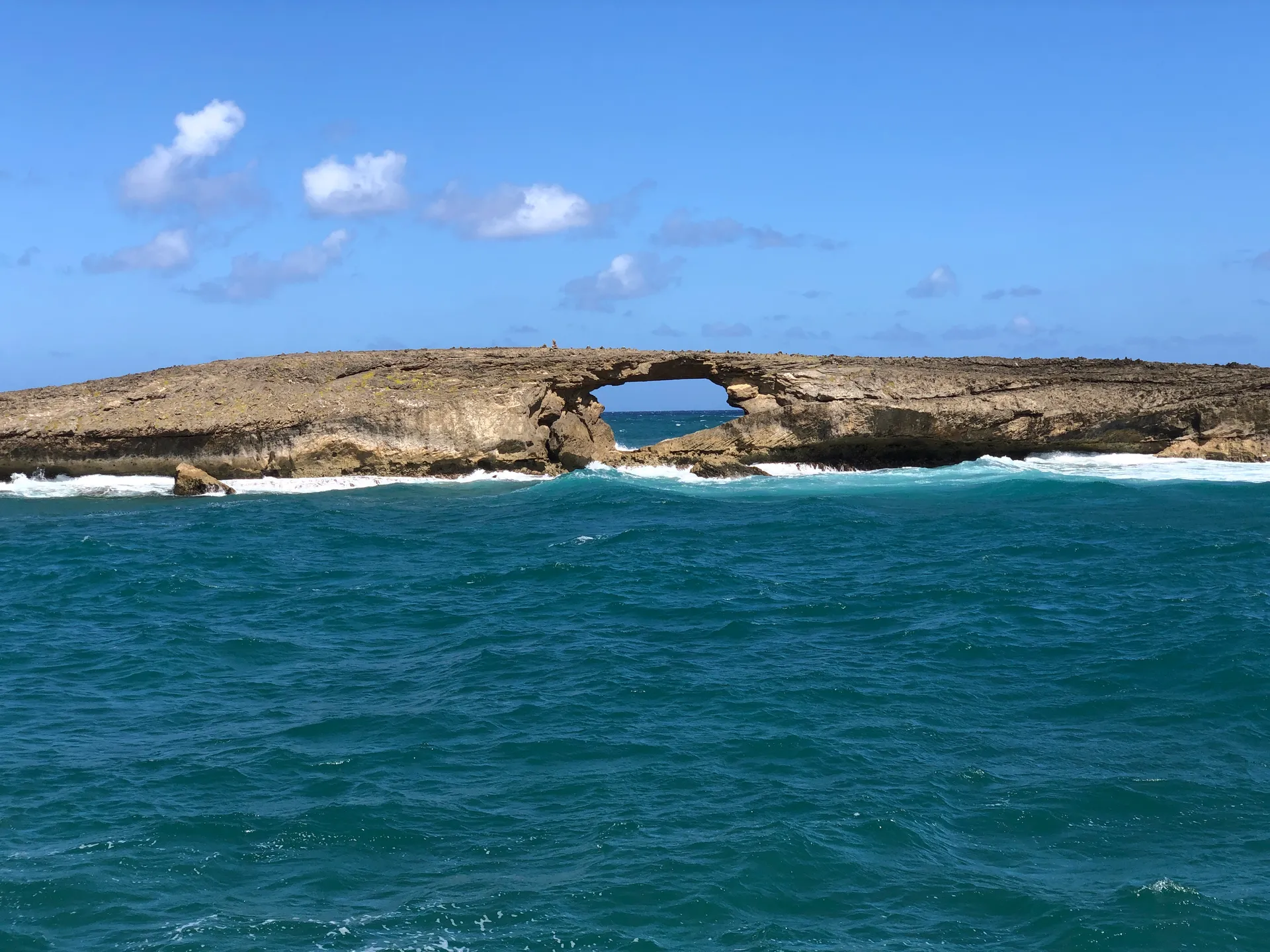 Natural sea arch at Laie Point on the north shore of Oahu, Hawaii.