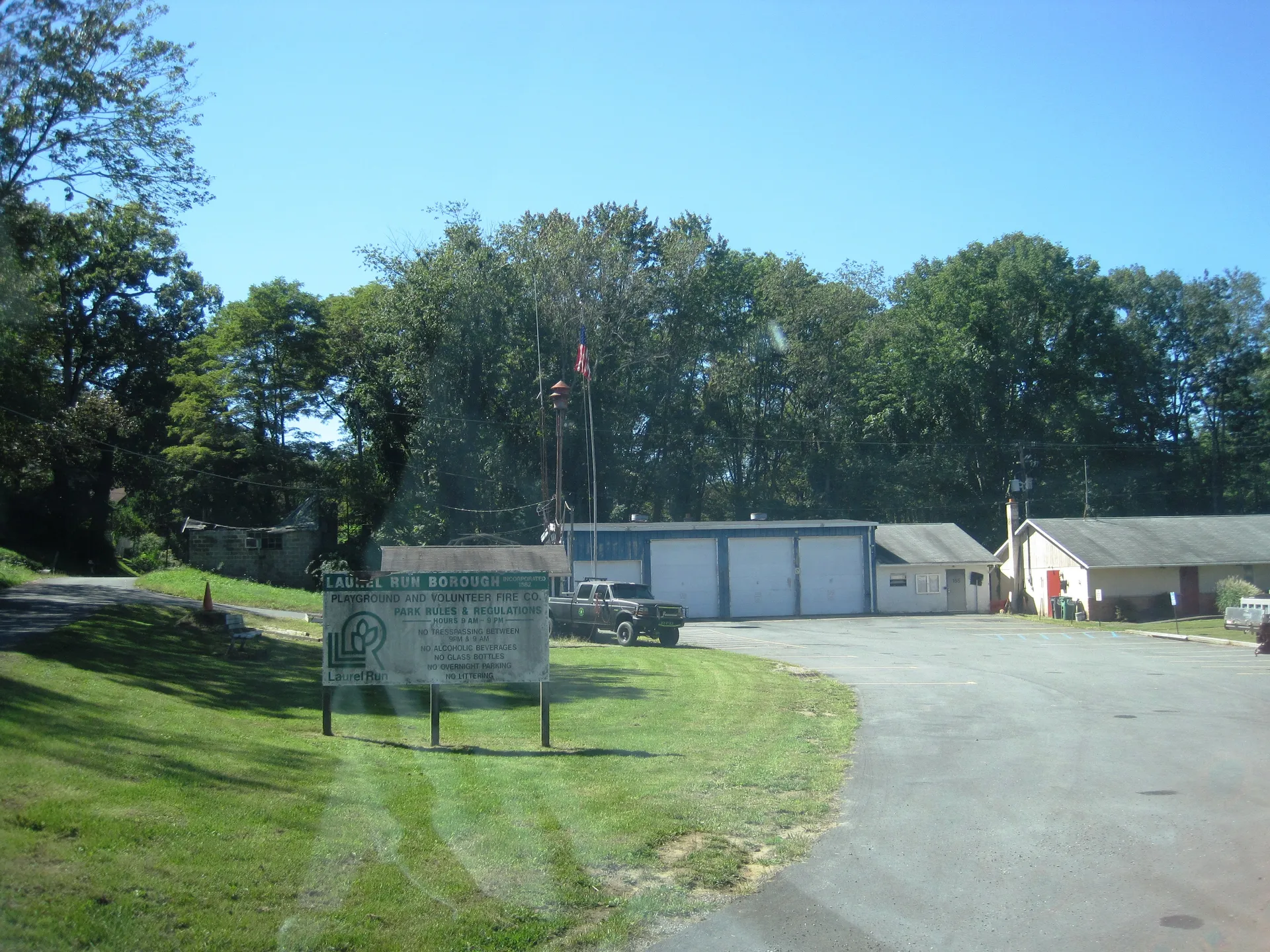 The Laurel Run municipal complex, with its fire department garage, sits behind trees and a lawn off Laurel Run Road.