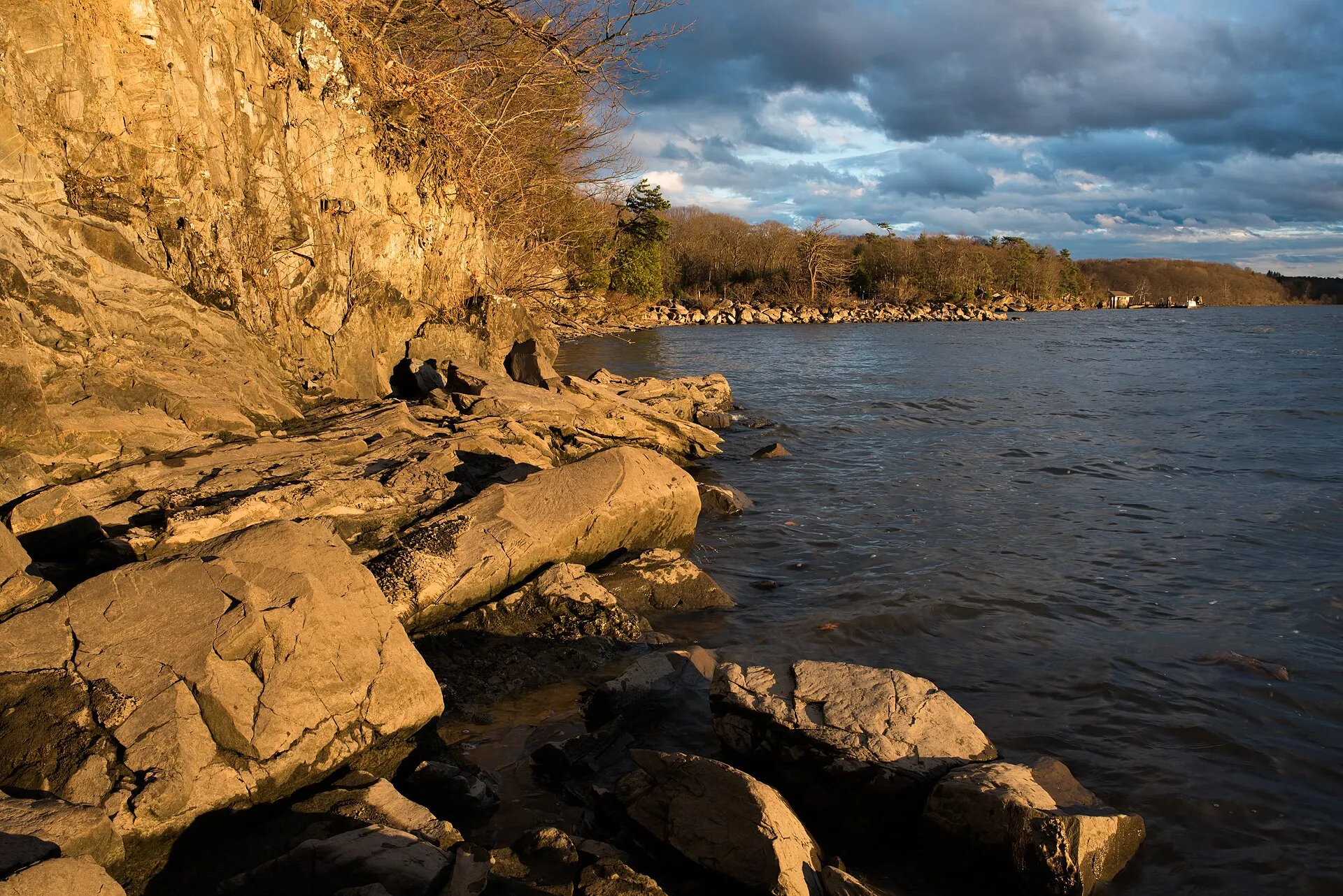Rocky shoreline of the Hudson River at Norrie State Park near Hyde Park, New York.