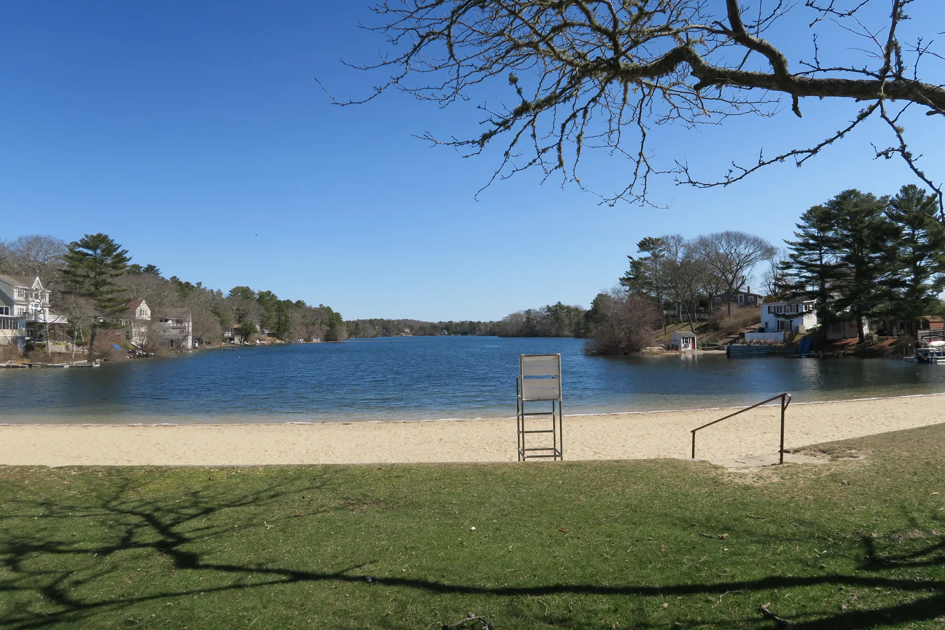 Sandy shore of White Island Pond in White Island Shores, Massachusetts.